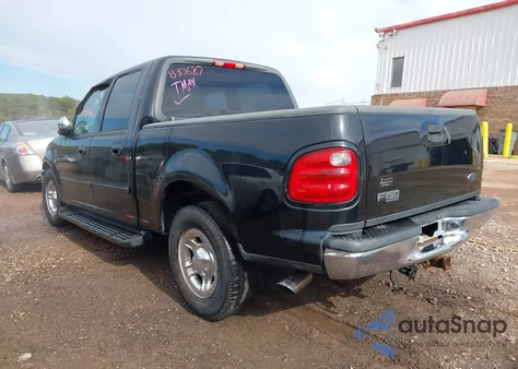 2003 Ford F-150 Lariat/Xlt z USA, uszkodzony, nr VIN 1FTRW07673KB30687